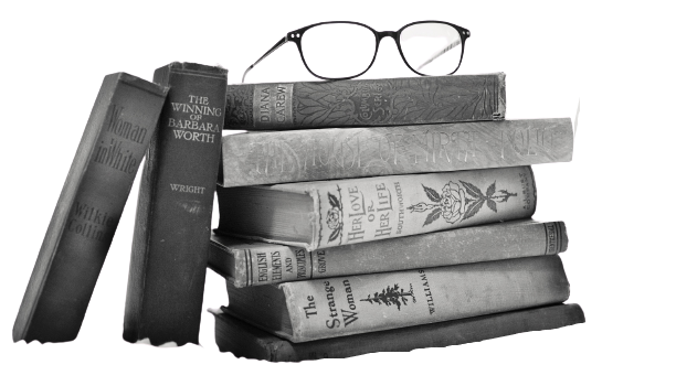 Books with a reading glass on top Books with a reading glass on top